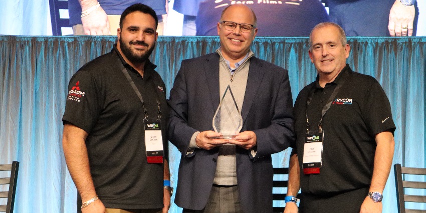 Gianni DeCicco [left] and Ted Teschner [right] of Rycor HVAC receiving the Pinnacle Award for Finance Excellence from METUS CFO Shane Lawrence [middle]. (Photo: Business Wire)